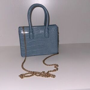 Blue snakeskin purse